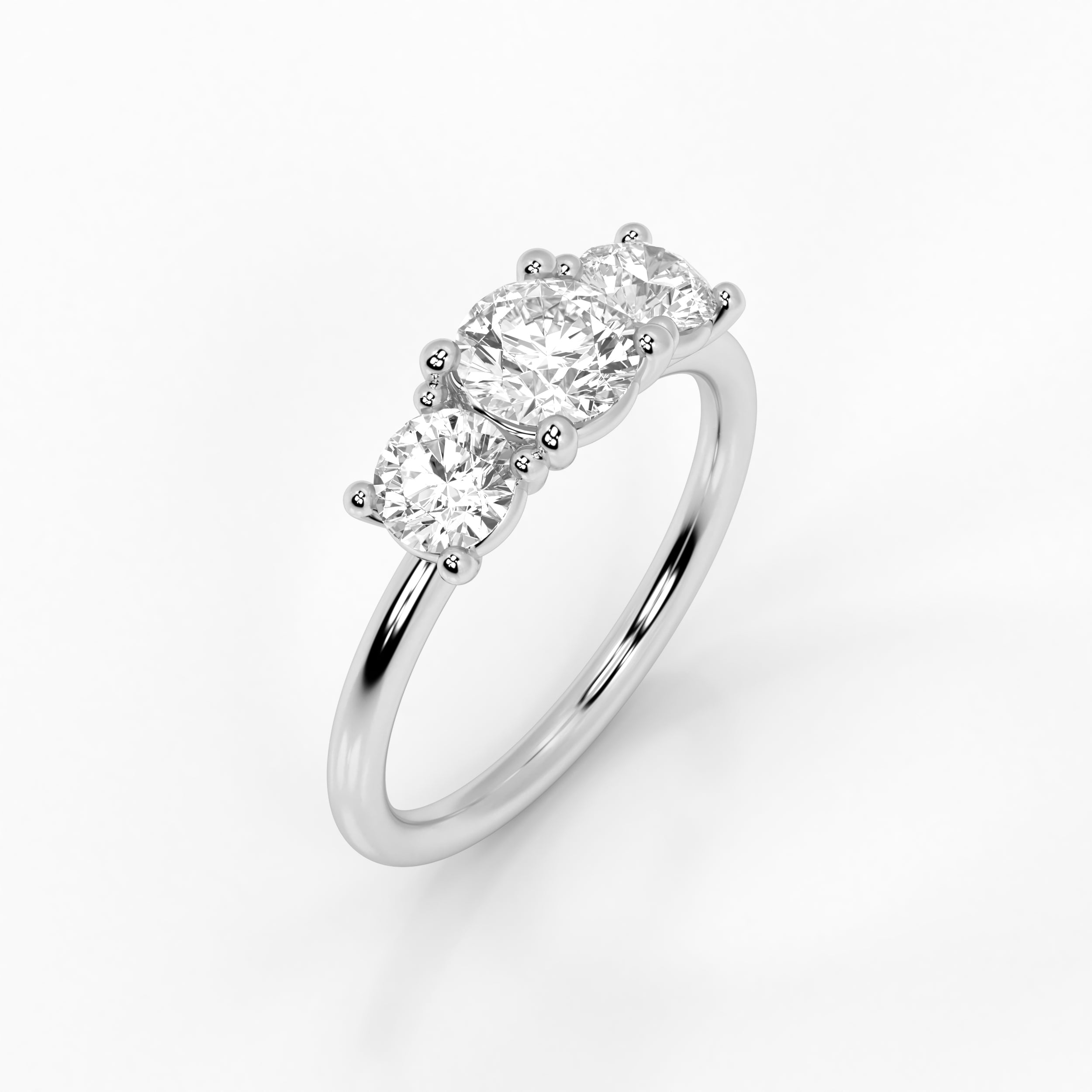 טבעת אירוסין זהב לבן 14 קראט משובצת שלושה יהלומים