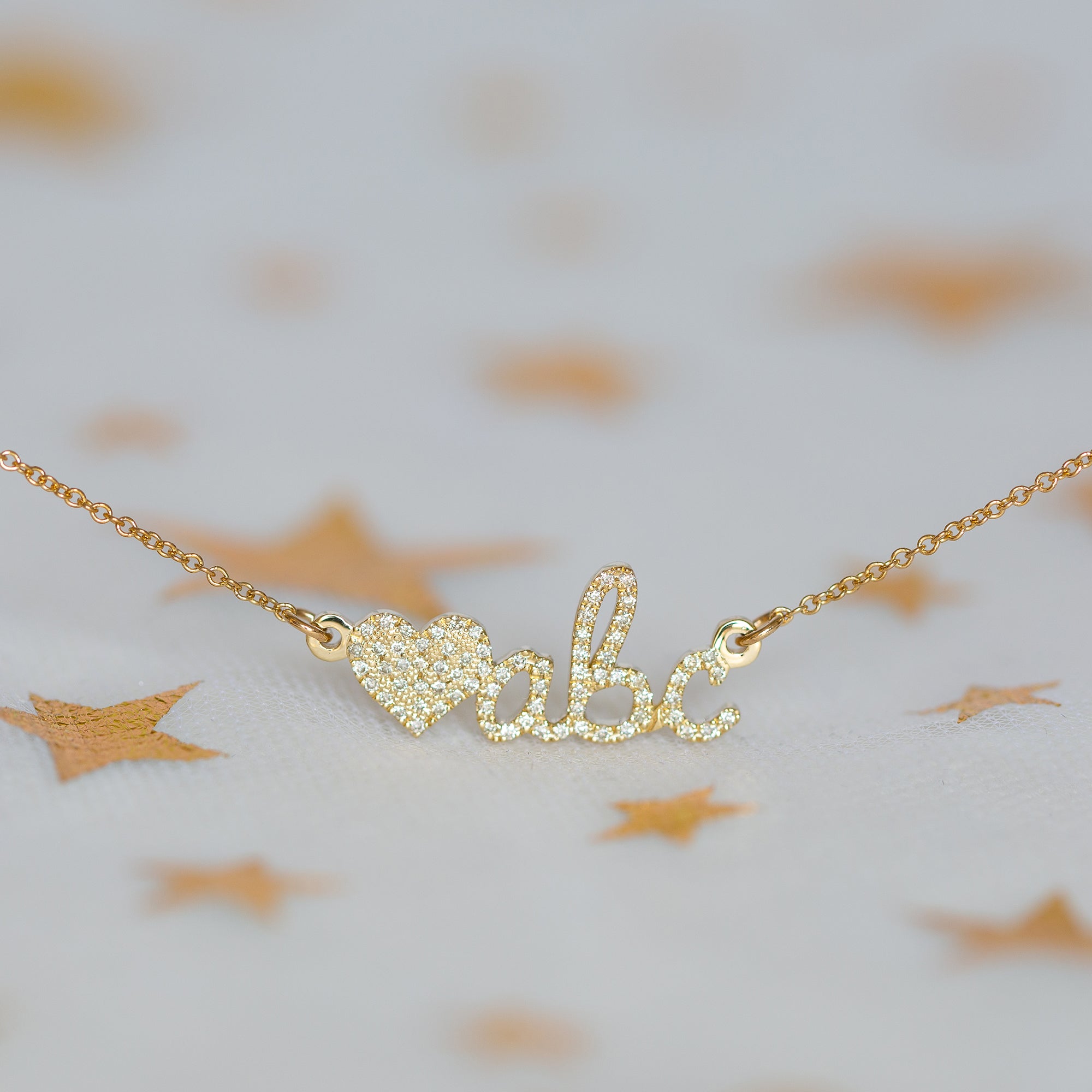 שרשרת שם מזהב עם לב משובצת יהלומים