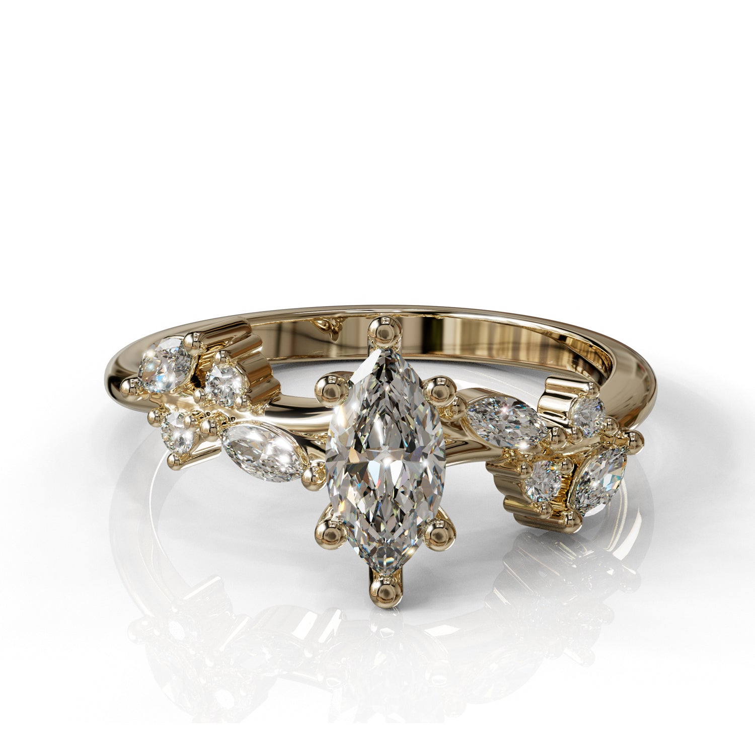 טבעת אירוסין עדינה בזהב צהוב 14 קראט עם יהלום מרקיזה ועיצוב פרחוני.